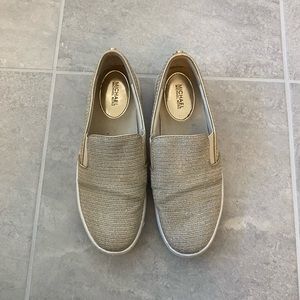 Gold Michael Kors slip on sneakers